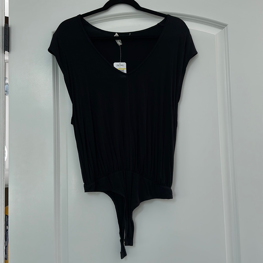 Free People short sleeve body suit! Never worn!